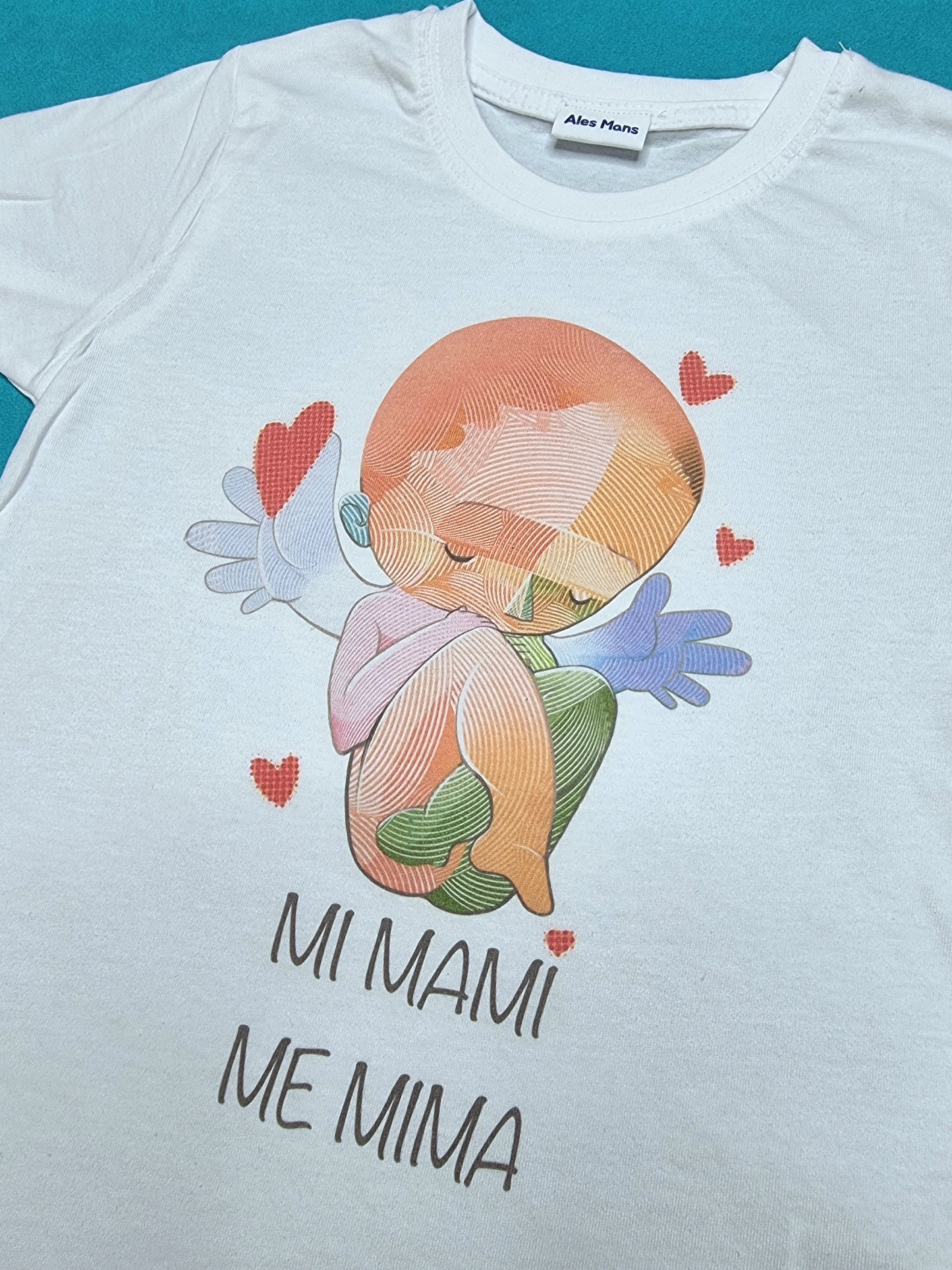 Camiseta infantil Mi mami me mima